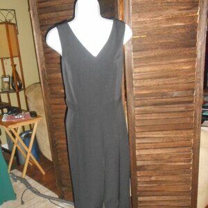 NWT Tahari black jumpsuit with silver buttons at legs, size 6